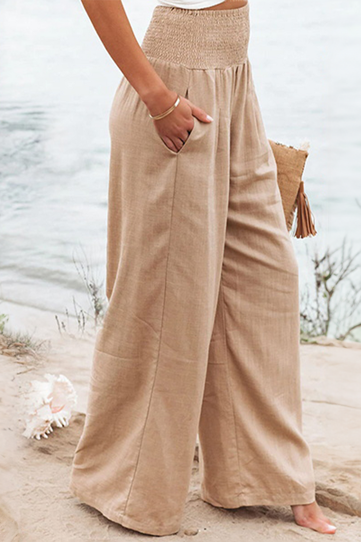 High-waist wide-leg palazzo pants for women, comfortable & flowy. Ideal for casual elegant summer looks.