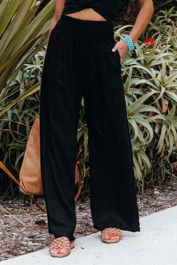Elegant wide-leg palazzo pants, women's boho style. Flowy & comfortable, perfect for summer casual wear.