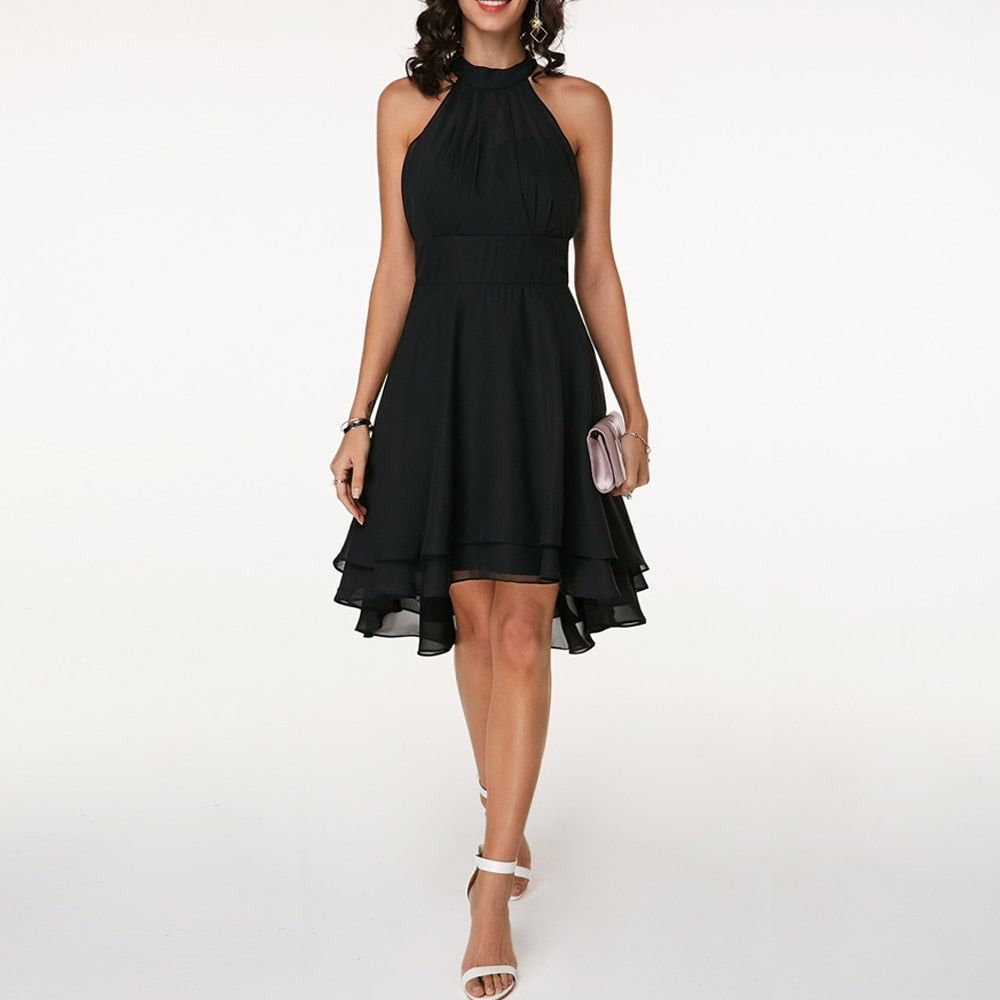 Chic layered hem mini dress for women, featuring a flattering halter neck. Great for elegant evening wear.