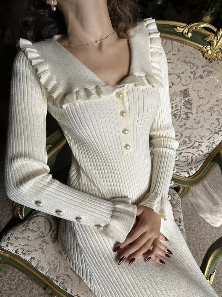 Elegant women's maxi dress featuring a high waist and delicate ruffles. Modest, cozy winter fashion.