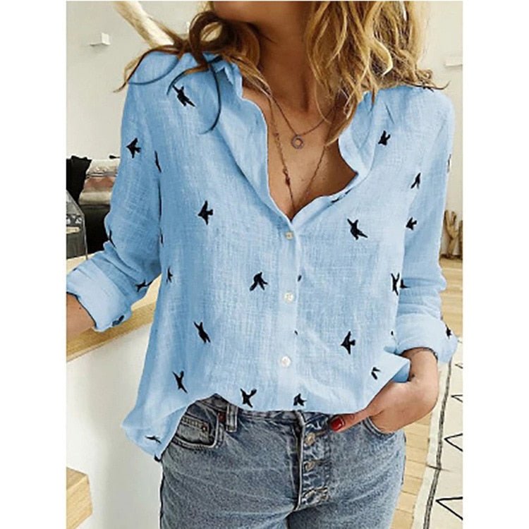 Women's elegant long-sleeve top with a charming bird print. Stylish & comfortable for all seasons.