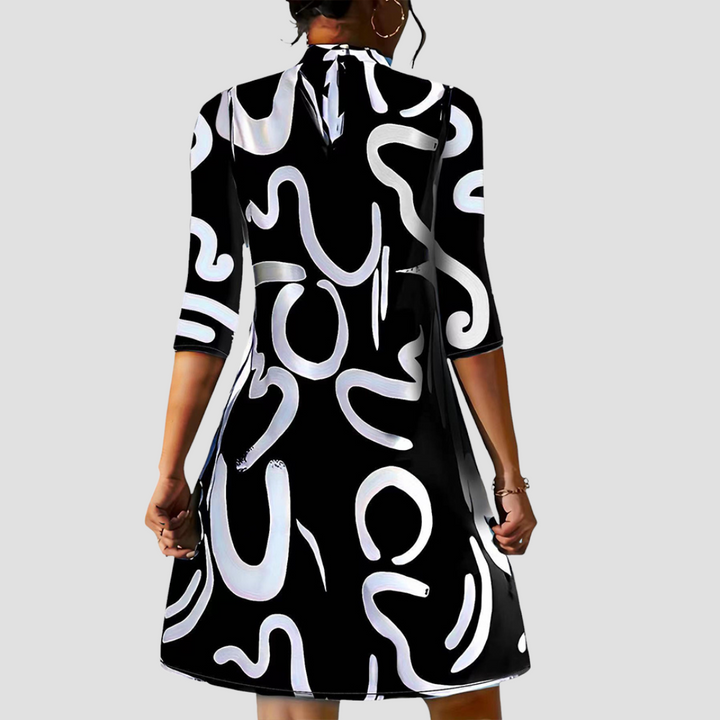 Stylish women's long sleeve round neck mini dress, perfect for fall office wear & casual events.