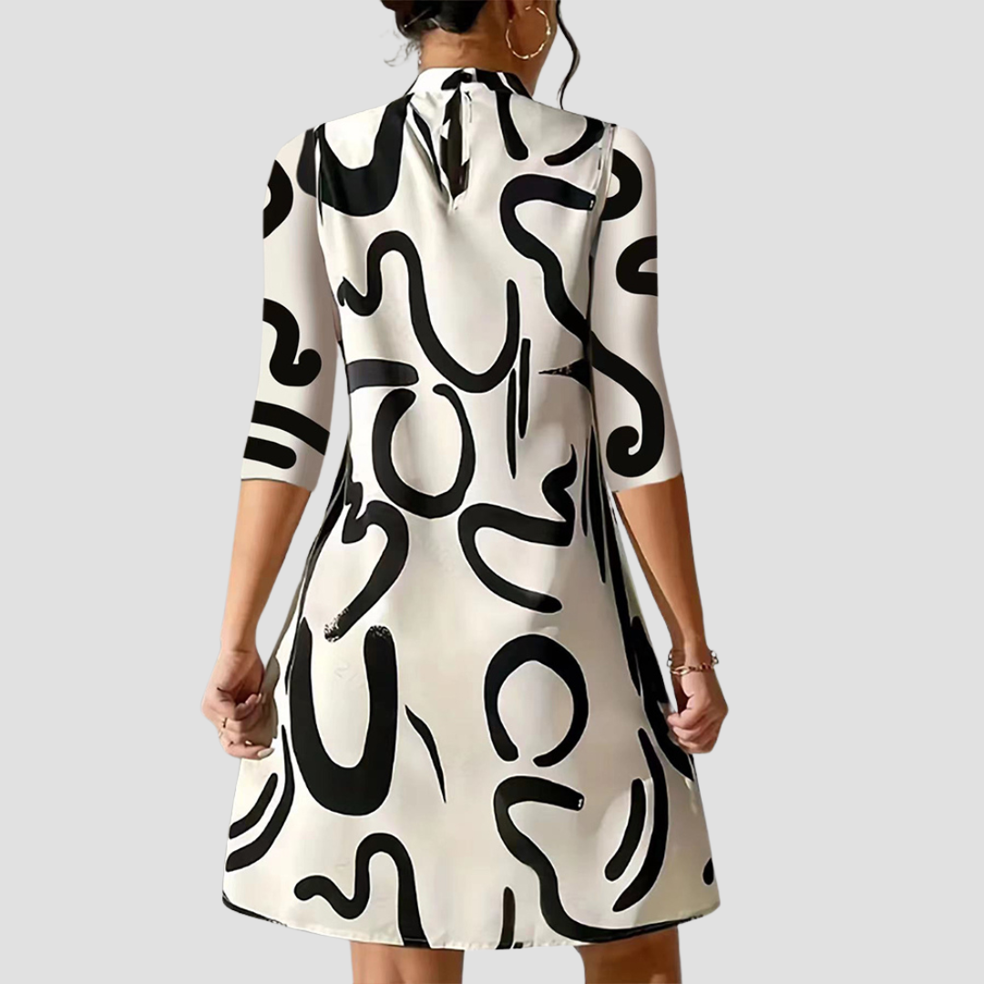 Versatile women's long sleeve mini dress, round neck design suitable for office, casual, or party wear.