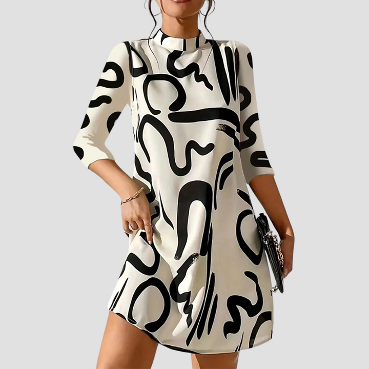 Comfortable women's long sleeve mini dress with elegant round neck, a solid color winter fashion staple.