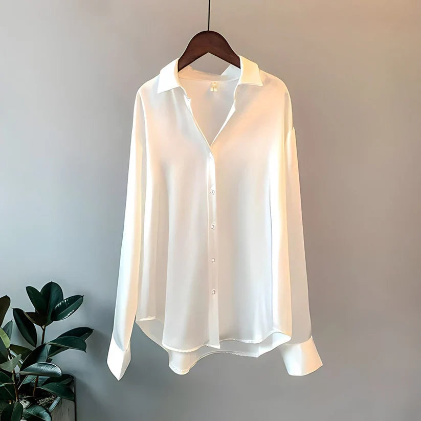 Clean design women's long sleeve work blouse, an elegant and versatile top for professional settings.