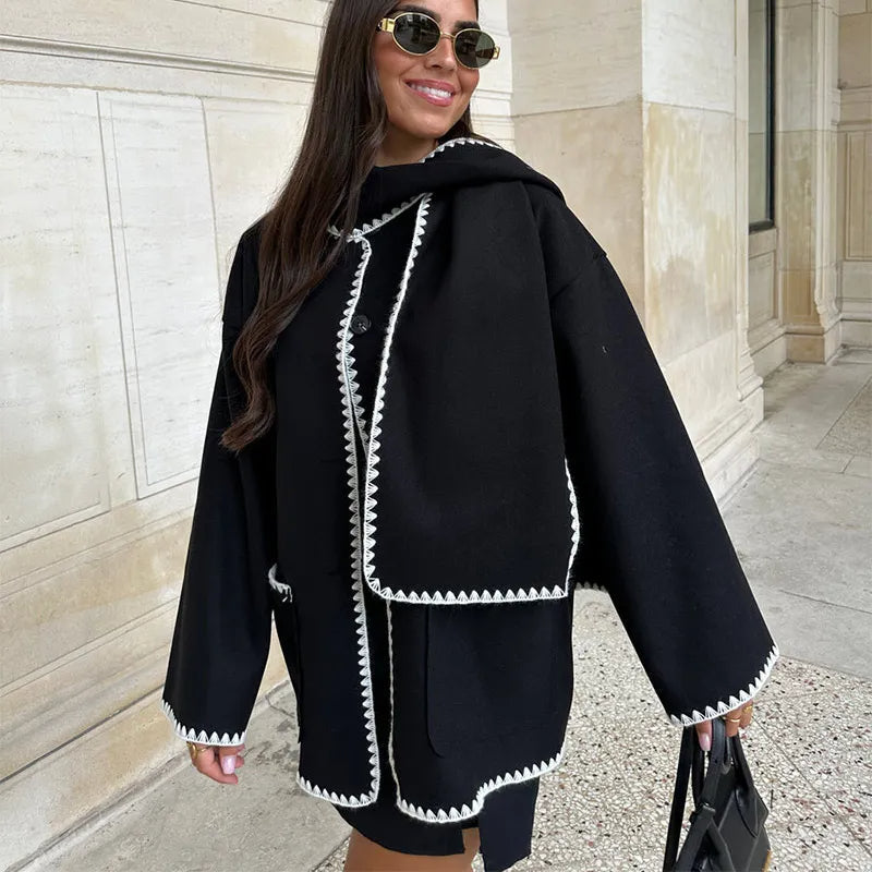 Women's elegant long wool coat in a classic style for autumn fashion.