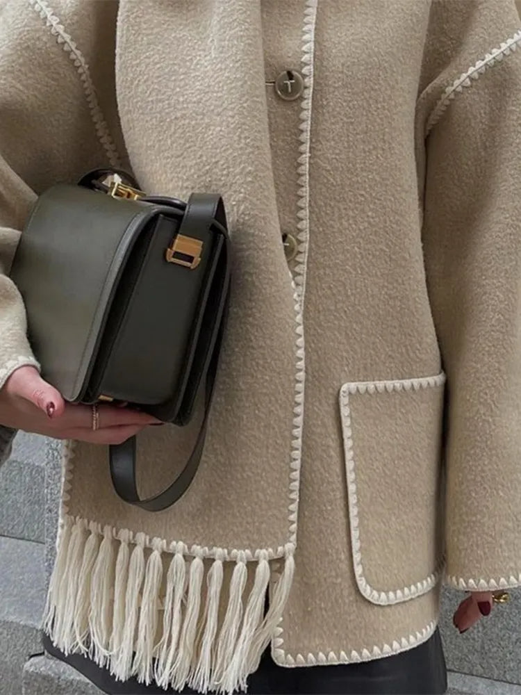 Comfortable long fitted wool coat for women, perfect elegant outerwear for autumn.