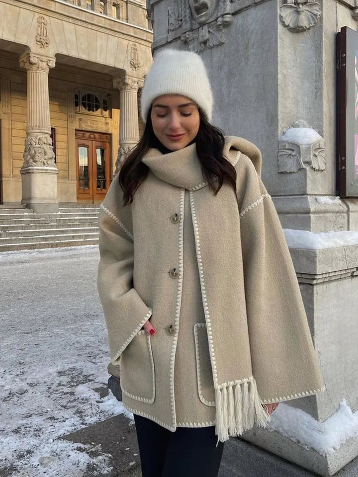 Classic women's long wool coat, ideal elegant outerwear for autumn and winter.