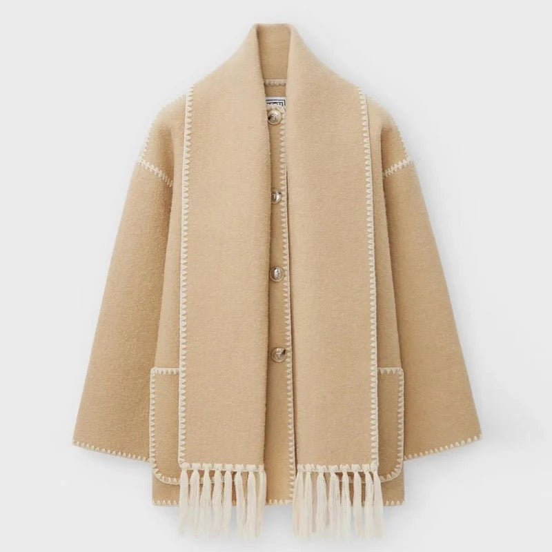 Chic long wool coat for women, ideal fitted outerwear for elegant autumn fashion.