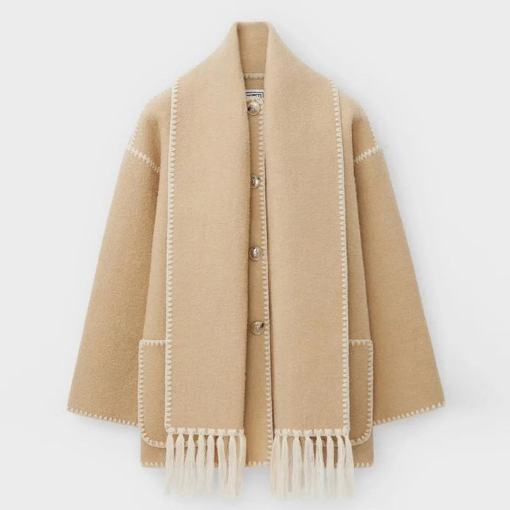 Chic long wool coat for women, ideal fitted outerwear for elegant autumn fashion.