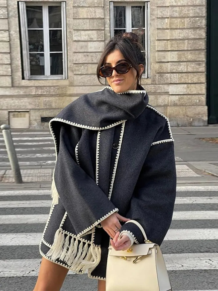 Women's elegant long fitted wool coat, perfect for autumn comfort and classic style.