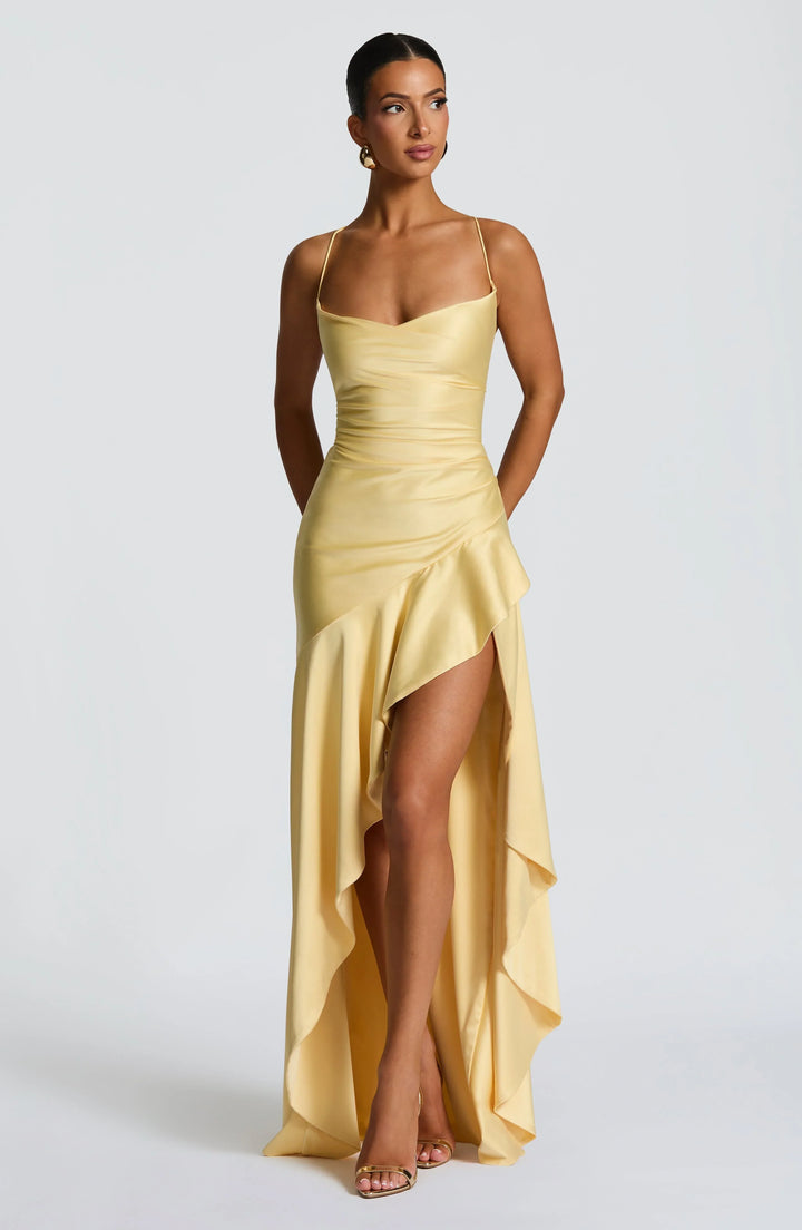 Women's long formal dress with draped neckline, high slit, and alluring open lace-up back.