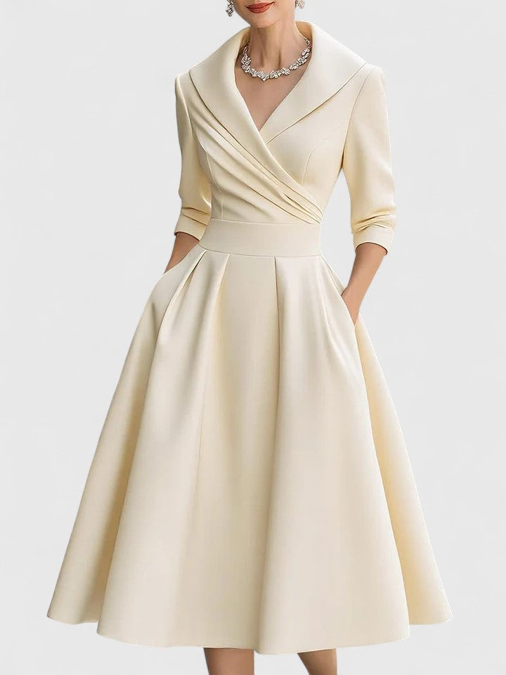 Versatile women's midi dress with pockets, offering elegant style for casual, cocktail & party wear.