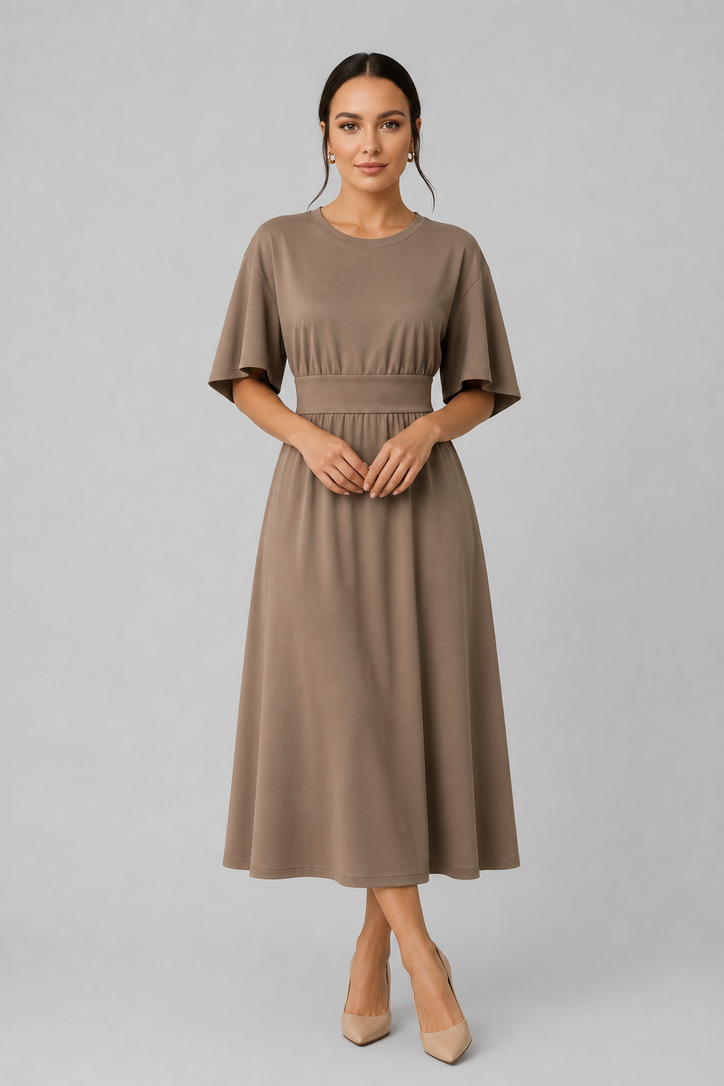 Stylish women's midi dress. Features wide sleeves, a chic waist belt & a modest round neck.