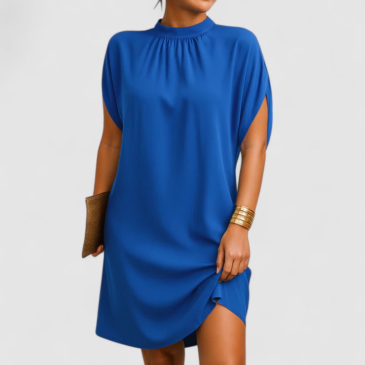 Modern women's mock neck midi dress, featuring relaxed batwing split sleeves and an asymmetric hem.
