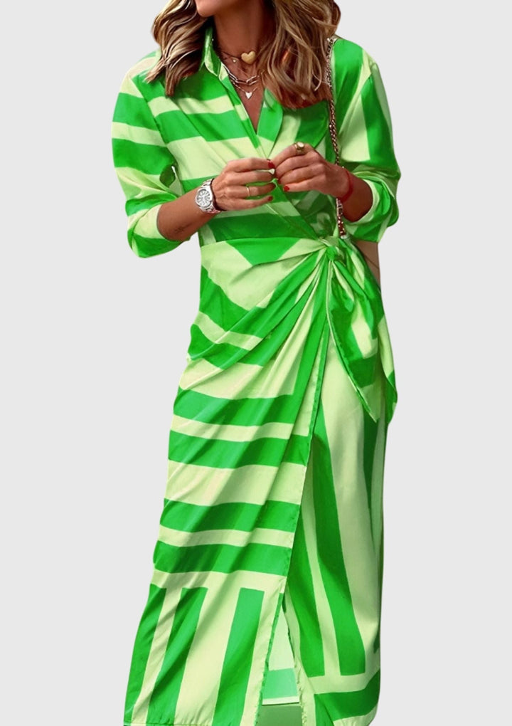 Modern print women's long sleeve wrap dress. Elegant midi design with a flattering fit, perfect for chic spring style.