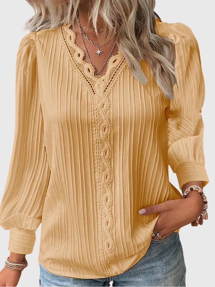 Women's elegant pullover blouse, versatile long sleeve top for chic office wear & casual style.