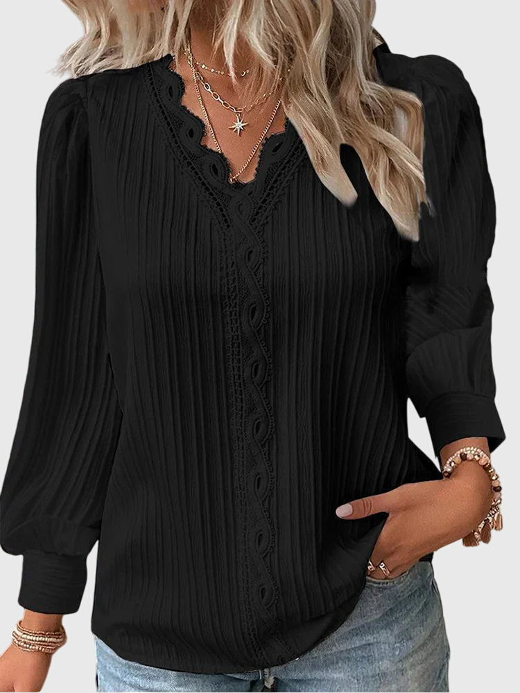 Versatile women's pullover blouse, elegant long sleeve top for stylish office wear or casual outings.