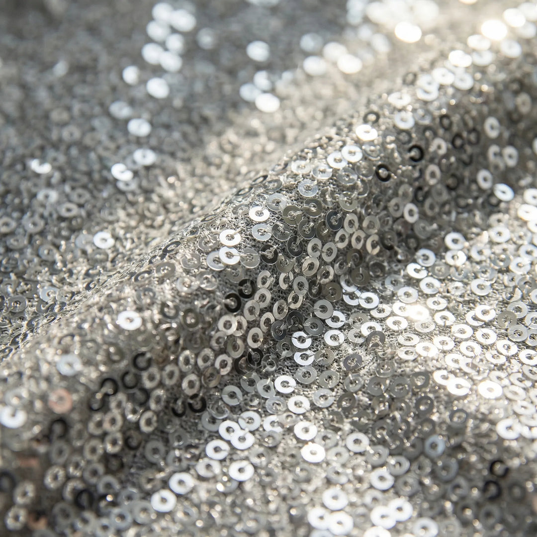 Stylish women's Lana shimmer blouse with V-neck and long sleeves, ideal for fall fashion.