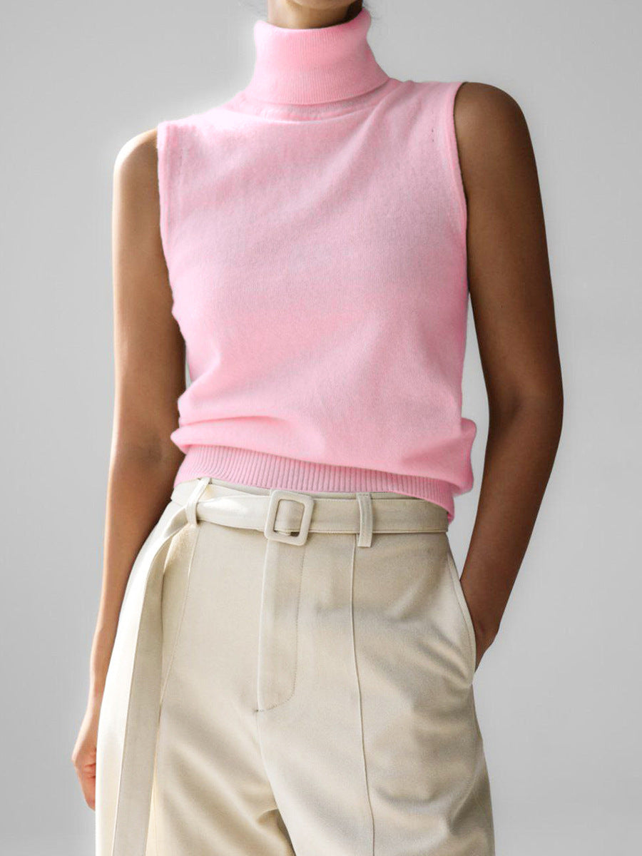Modern slim fit women's sleeveless mock neck knit top, a versatile wardrobe essential.