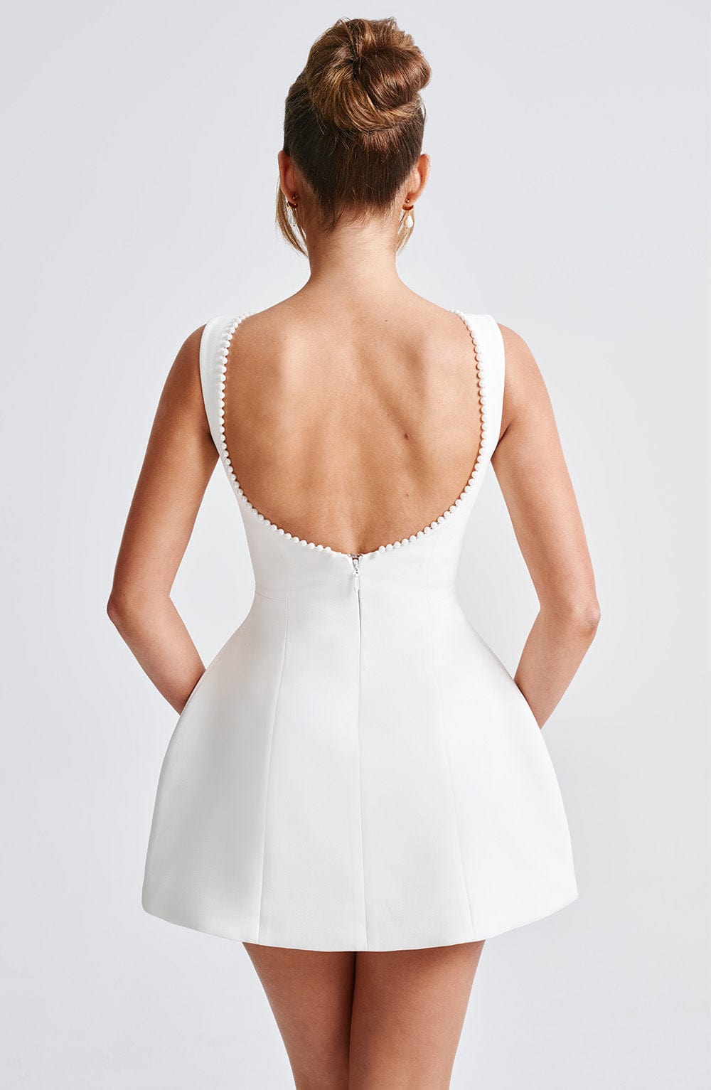 Chic women's structured mini dress, ideal for cocktail parties, evening wear & sophisticated events.