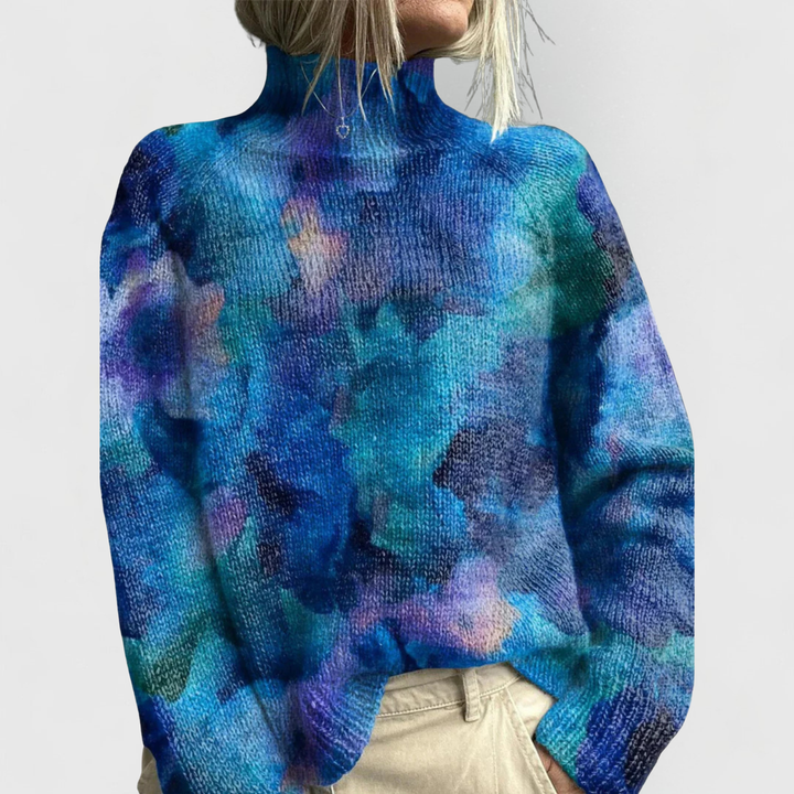 Chic women's blue turtleneck sweater for winter. Soft and warm knitwear, ensuring cozy elegance for any occasion.