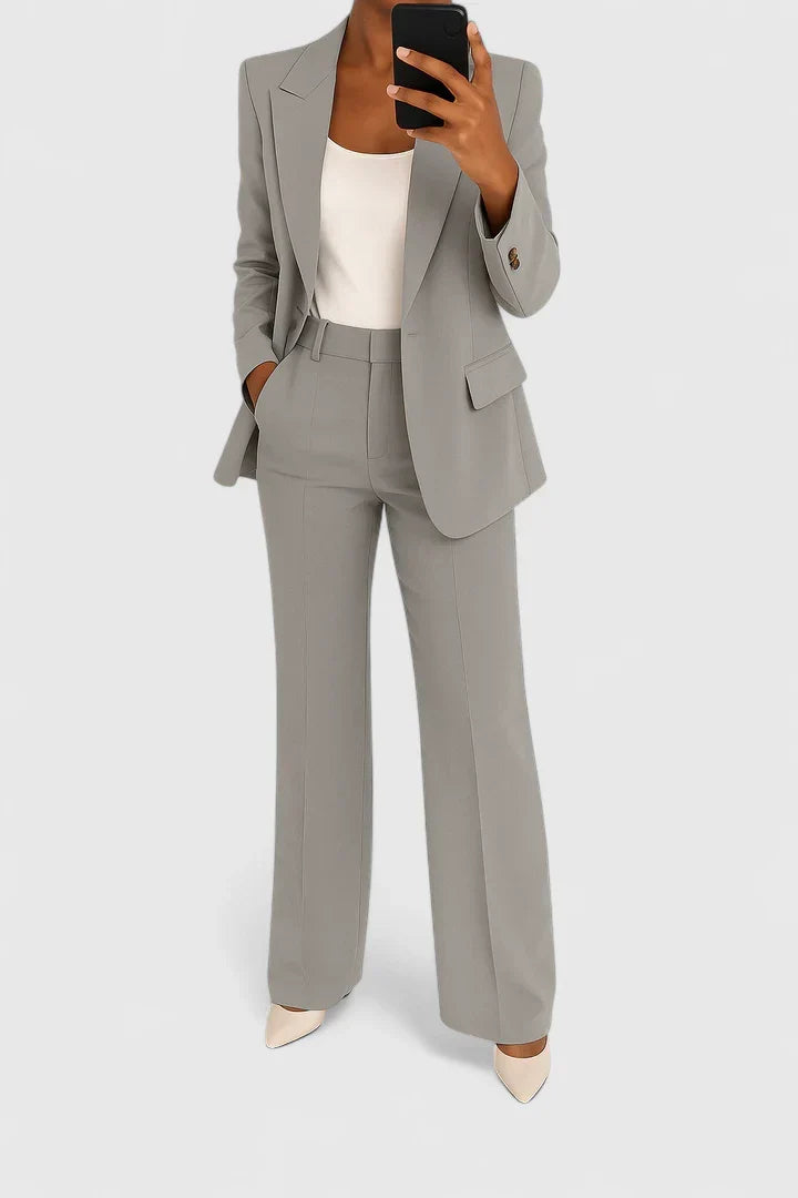 Stylish women's professional two-piece suit for elegant office wear & business meetings.