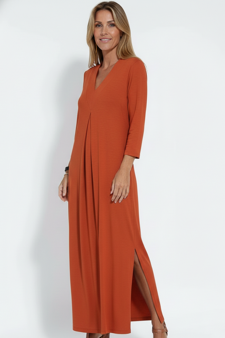 Relaxed fit V-neck maxi dress for women, ideal for beach or resort wear, featuring an elegant side slit.