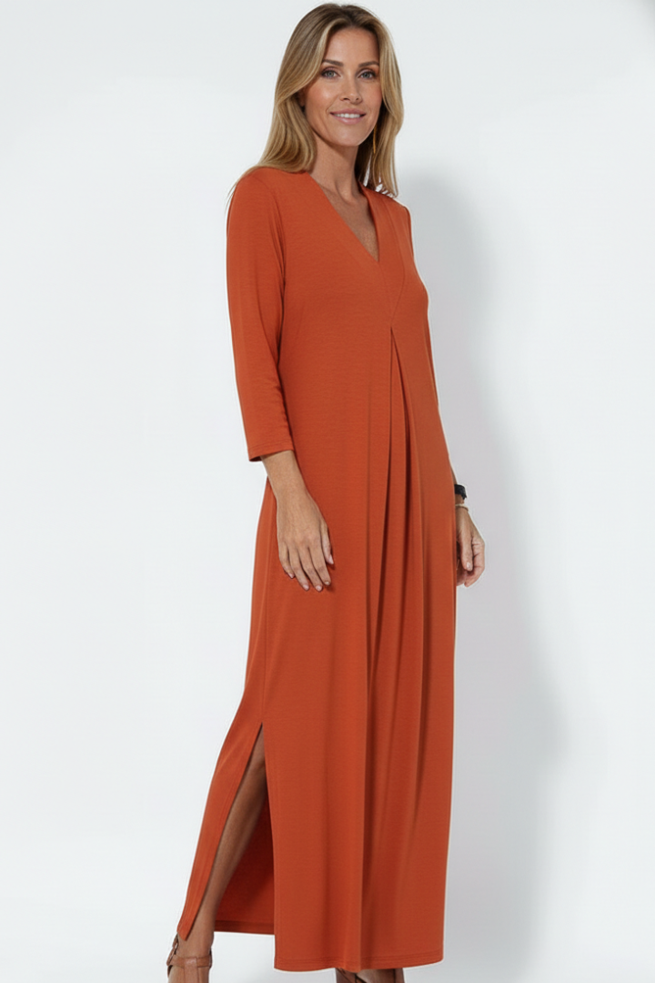 Women's V-neck long dress, perfect for warm weather, with a stylish side slit enhancing its flowy design.