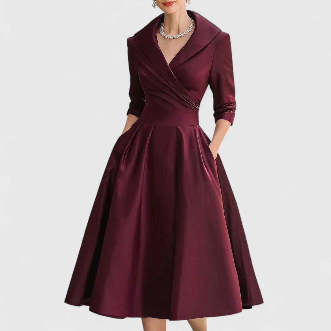 Flattering V-neck midi dress for women, featuring comfortable 3/4 sleeves & effortless style.