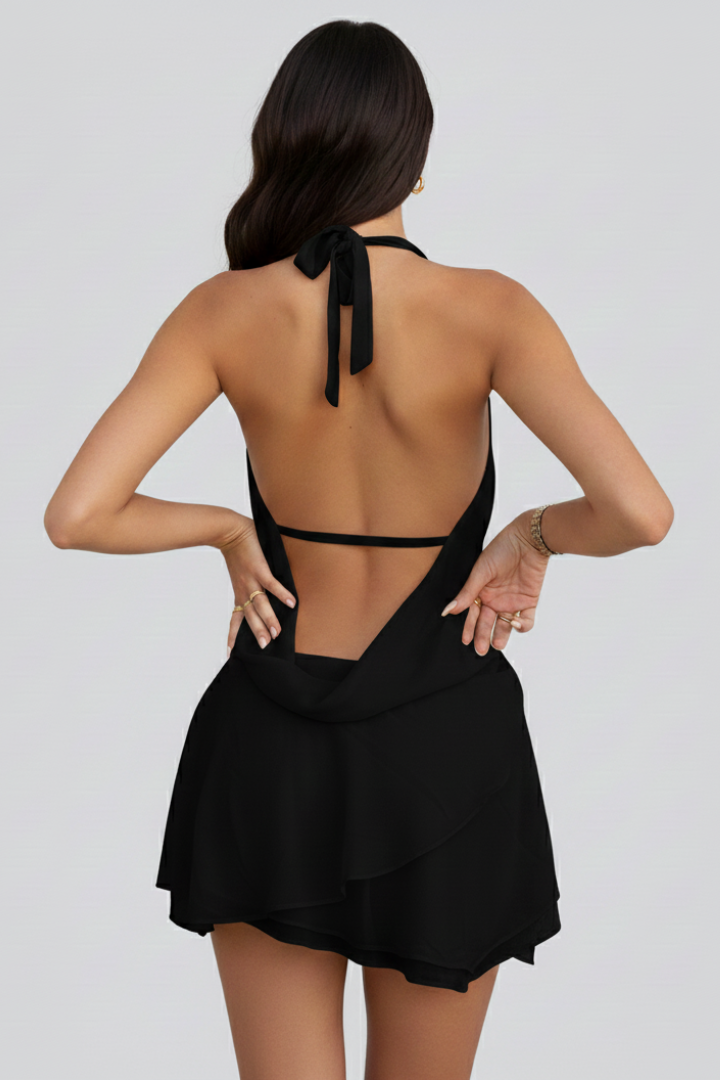 Striking women's V-neck open back mini dress. A bold fashion statement for parties & evening wear. Sleeveless.