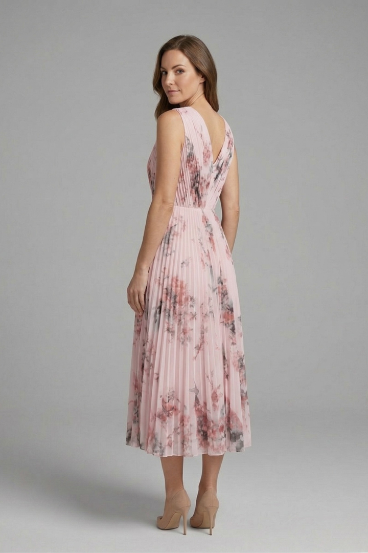 Beautiful women's V-neck midi dress with elegant pleats. A chic sleeveless option for any occasion.