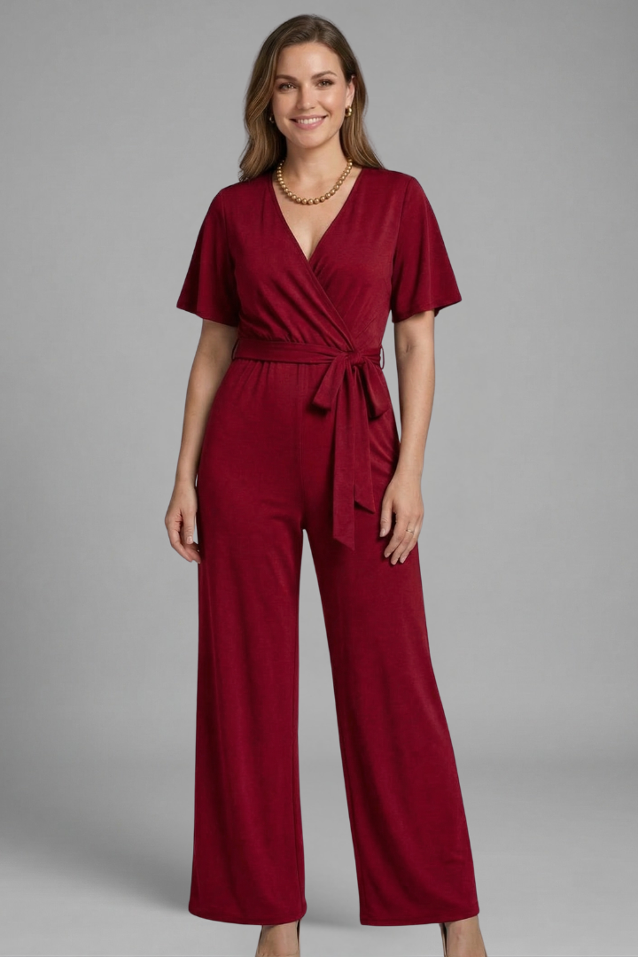 Stylish women's wrap front jumpsuit with tie waist, perfect for formal events or casual wear.