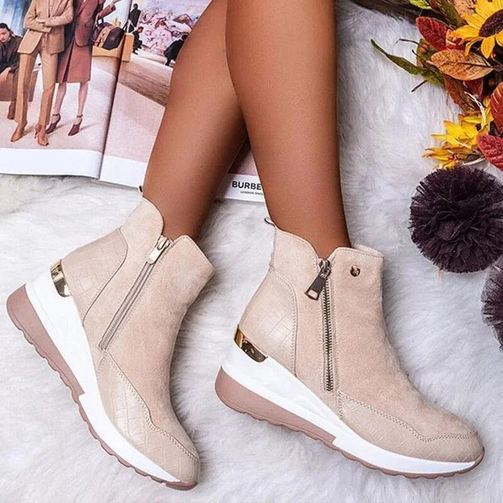 Stylish women's black orthopedic ankle boots, perfect for fall and winter comfort & foot support.