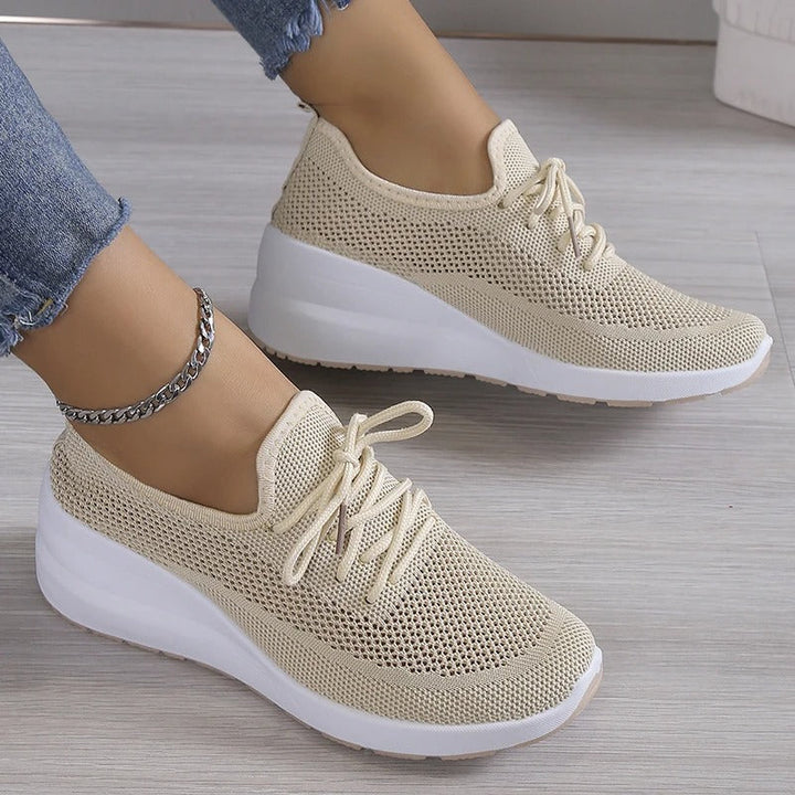 Women's elevated platform wedge sneakers for ultimate comfort and stylish everyday wear.