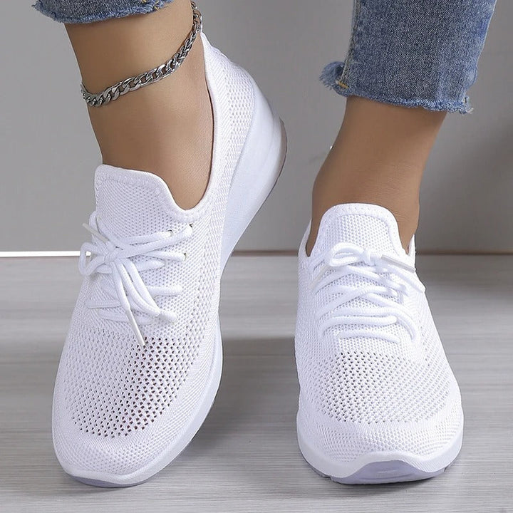 Comfortable women's wedge platform sneakers, ideal for casual outfits and versatile everyday fashion.
