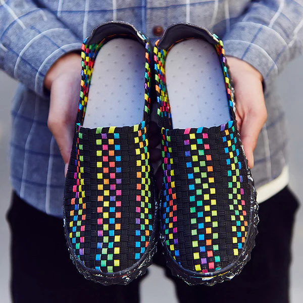 Close-up of recycled material on Eliana women's sneakers, highlighting durable yet soft texture & stitching.