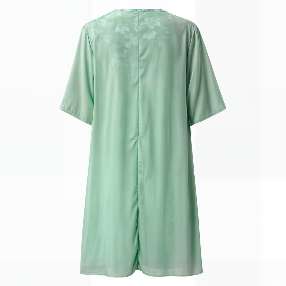 Women's elegant knee-length floral A-line dress, versatile for parties & casual events.