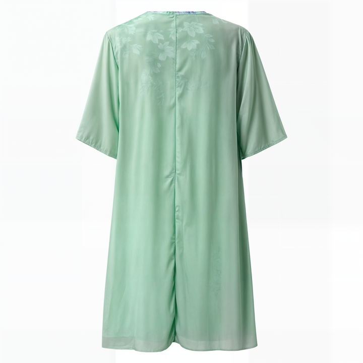 Women's elegant knee-length floral A-line dress, versatile for parties & casual events.