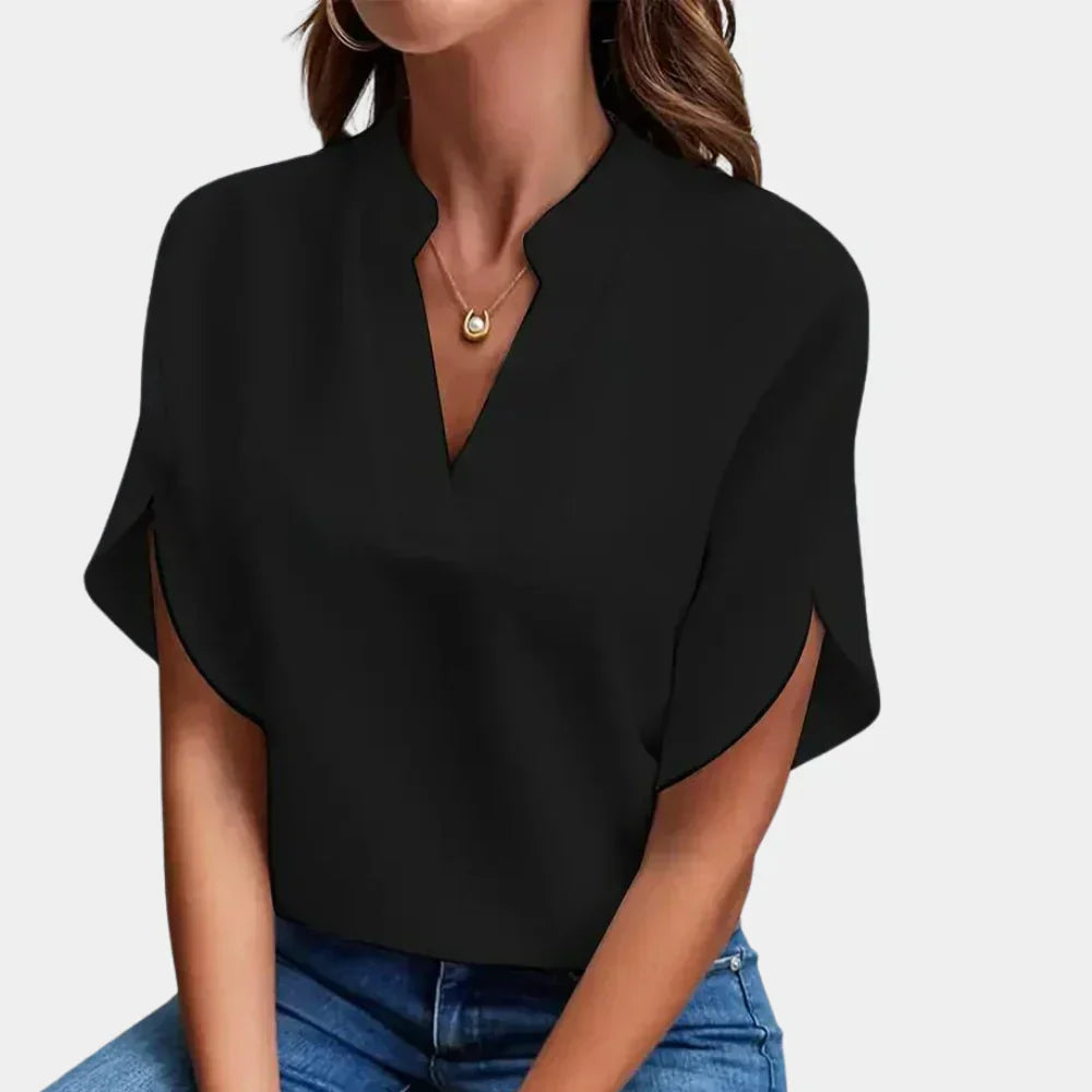 Women's Ella airy summer blouse with short sleeves and round neck, perfect for casual everyday wear.