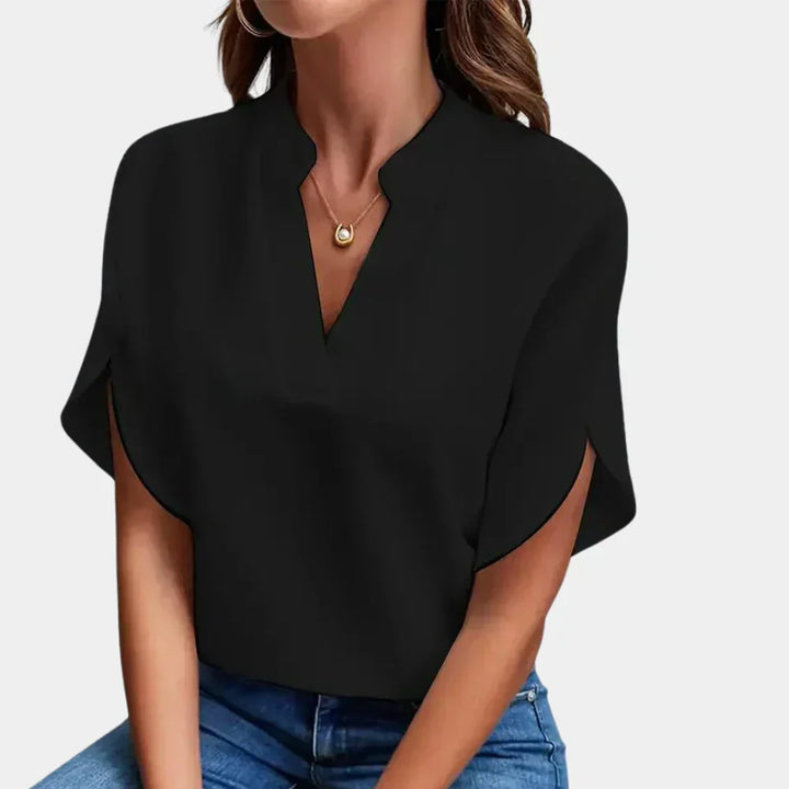 Women's Ella airy summer blouse with short sleeves and round neck, perfect for casual everyday wear.