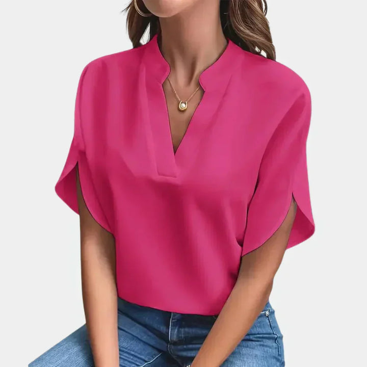 Casual women's Ella blouse, an airy short sleeve top with a round neck, ideal for summer fashion.