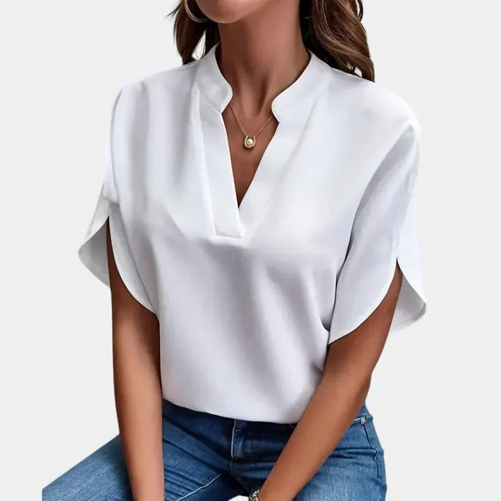 Short sleeve Ella summer blouse for women, featuring a round neck and airy fabric for a relaxed casual look.