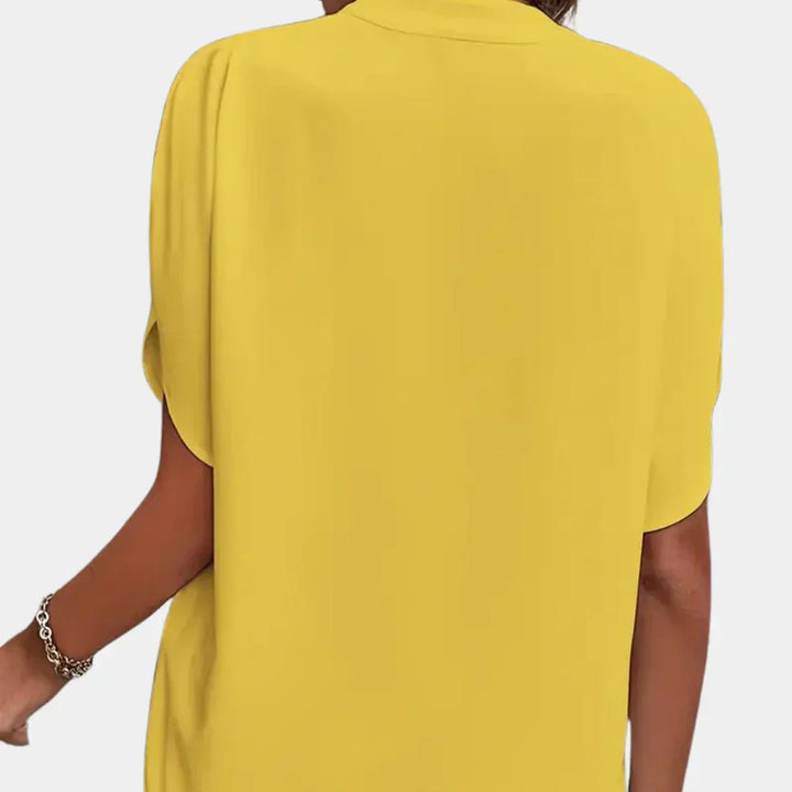 Lightweight Ella women's blouse, a relaxed fit summer top with short sleeves and a comfortable round neck.