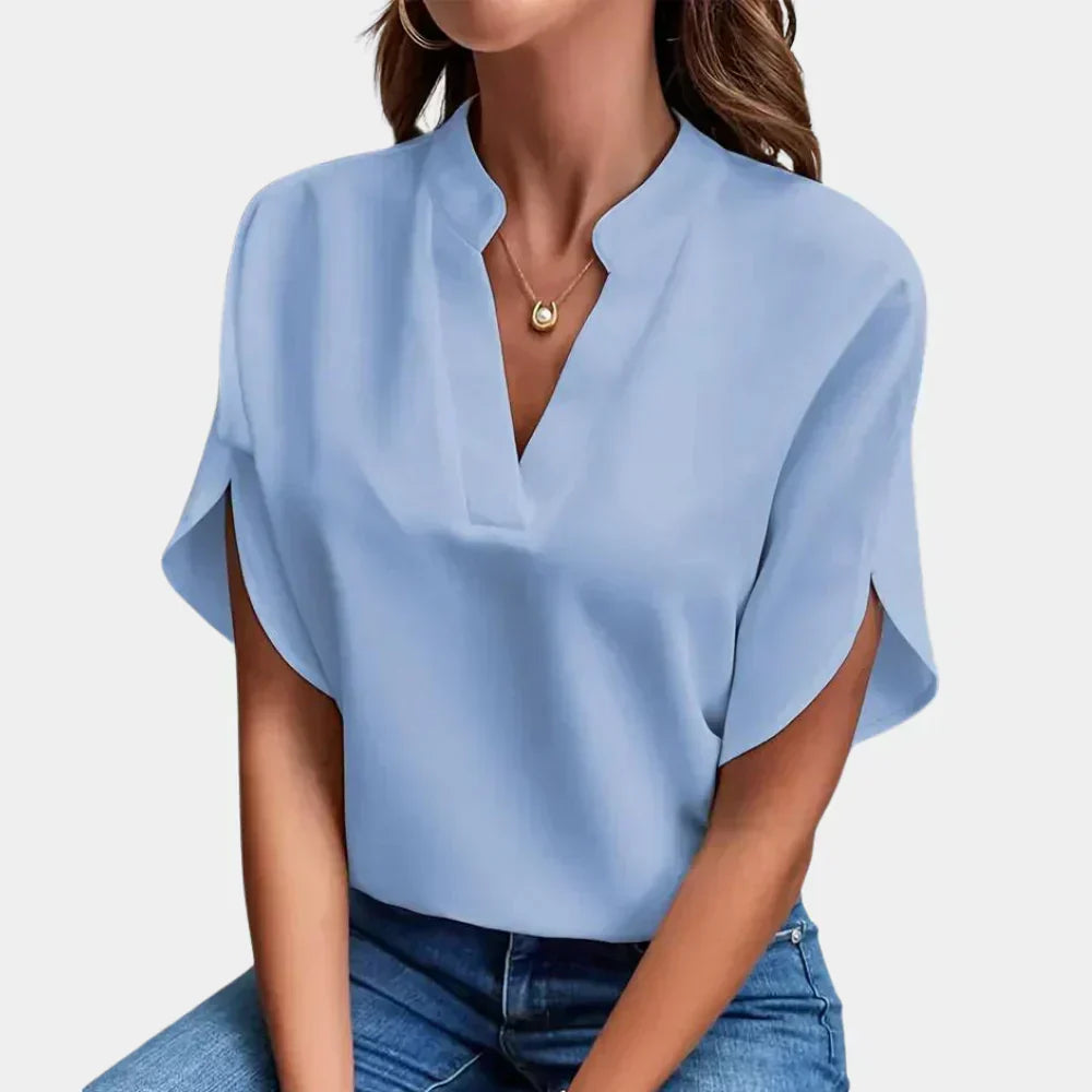 Casual Ella women's airy blouse, a short sleeve summer top with a round neck, ideal for warm weather style.