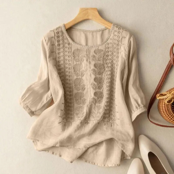 Stylish women's 3/4 sleeve embroidered top, relaxed fit for spring/summer, ideal for versatile casual fashion.