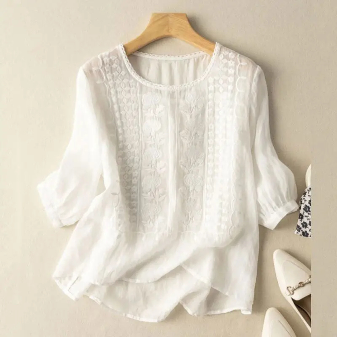 Chic women's embroidered blouse featuring 3/4 sleeves & a relaxed fit, a stylish choice for spring casual wear.