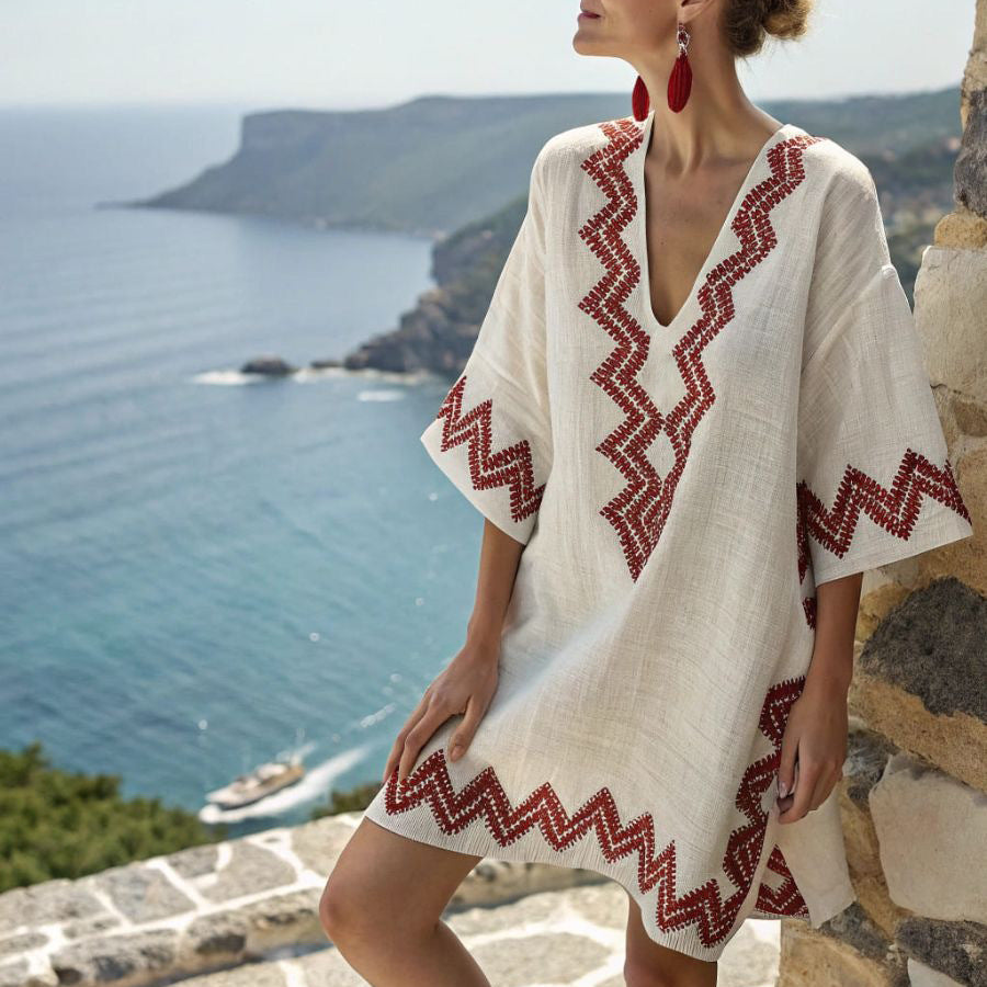 Women's embroidered kimono tunic dress with V-neck, short sleeves, & relaxed fit for beach holidays & summer resort wear.
