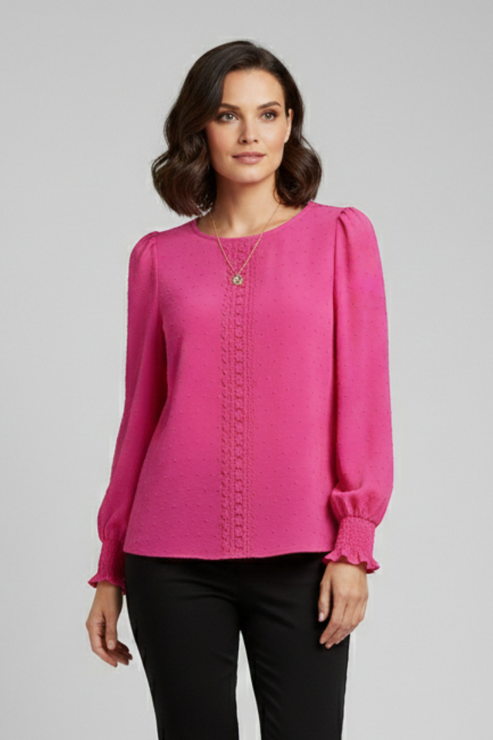 Versatile women's long sleeve blouse with delicate embroidery, round neck, and elastic cuffs. Ideal for casual style.