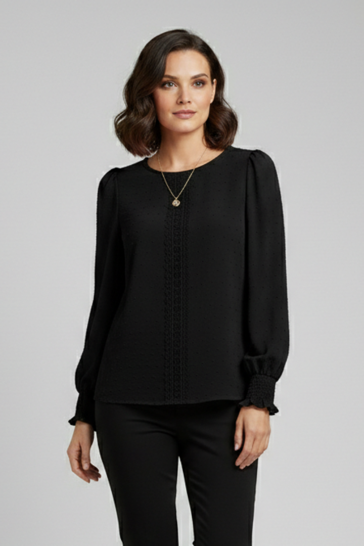 Elegant women's long sleeve blouse with intricate embroidery, round neck, button detail, and comfortable elastic cuffs.
